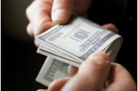 МВС: Начальника відділу міліції на ринку Сьомий кілометр спіймали на хабарі