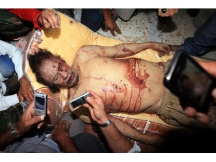 Патологоанатоми назвали нову причину смерті Каддафі