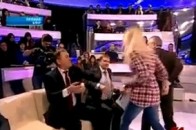 FEMEN розбила губу Колесніченку і послала владу та опозицію до чортової матері