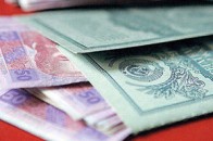 Роздача «тисячі Януковича» загрожує дефолтом