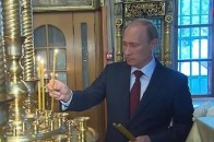 Верх цинізму: Путін поставив свічки за «захисників Новоросії» ВІДЕО