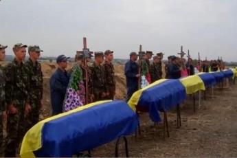 Поховали 11 невідомих бійців, які загинули в АТО ВІДЕО