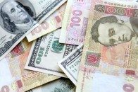 Долар на міжбанку розширив спред до 26,0-26,7 гривень
