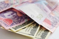 Обіцяного долара по 22 гривні чекати не варто - експерти