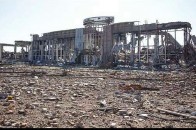 На території донецького аеропорту ОБСЄ виявила людські рештки в уніформі