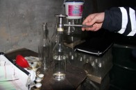 Лучанин у гаражі облаштував міні-спиртогорілчаний комбінат
