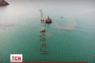 У Росії визнали, що не потягнуть будівництво мосту до Криму. ВІДЕО
