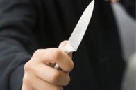 Жінку, яка дорікала чоловікові за п’янство, той погрожував пристрелити