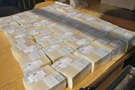Українець намагався переслати до Гонконгу 24 кг купюр по одній гривні