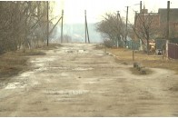 Ями, вібрація стін, води по коліна: лучани обурені жахливою дорогою на своїй вулиці