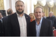Депутат Миколаївської облради привітав виборців з Новим роком портретом Путіна